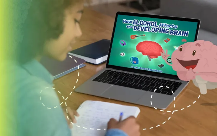 Image of a girl working on a Discovery Education module at her laptop