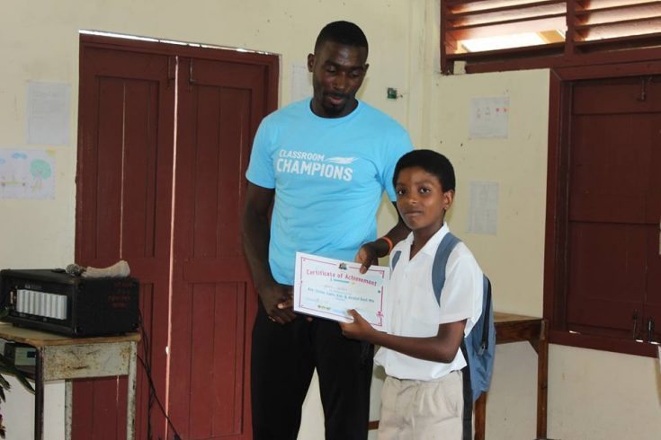 Kurt Felix hands out certificate to Mt Rose SDA student