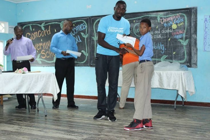 Student Receiving Certificate and Bag at Ask Listen Learn ceremony at Concord Gvt2